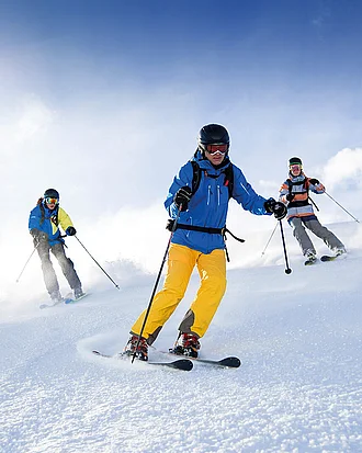 Drei Skifahrer